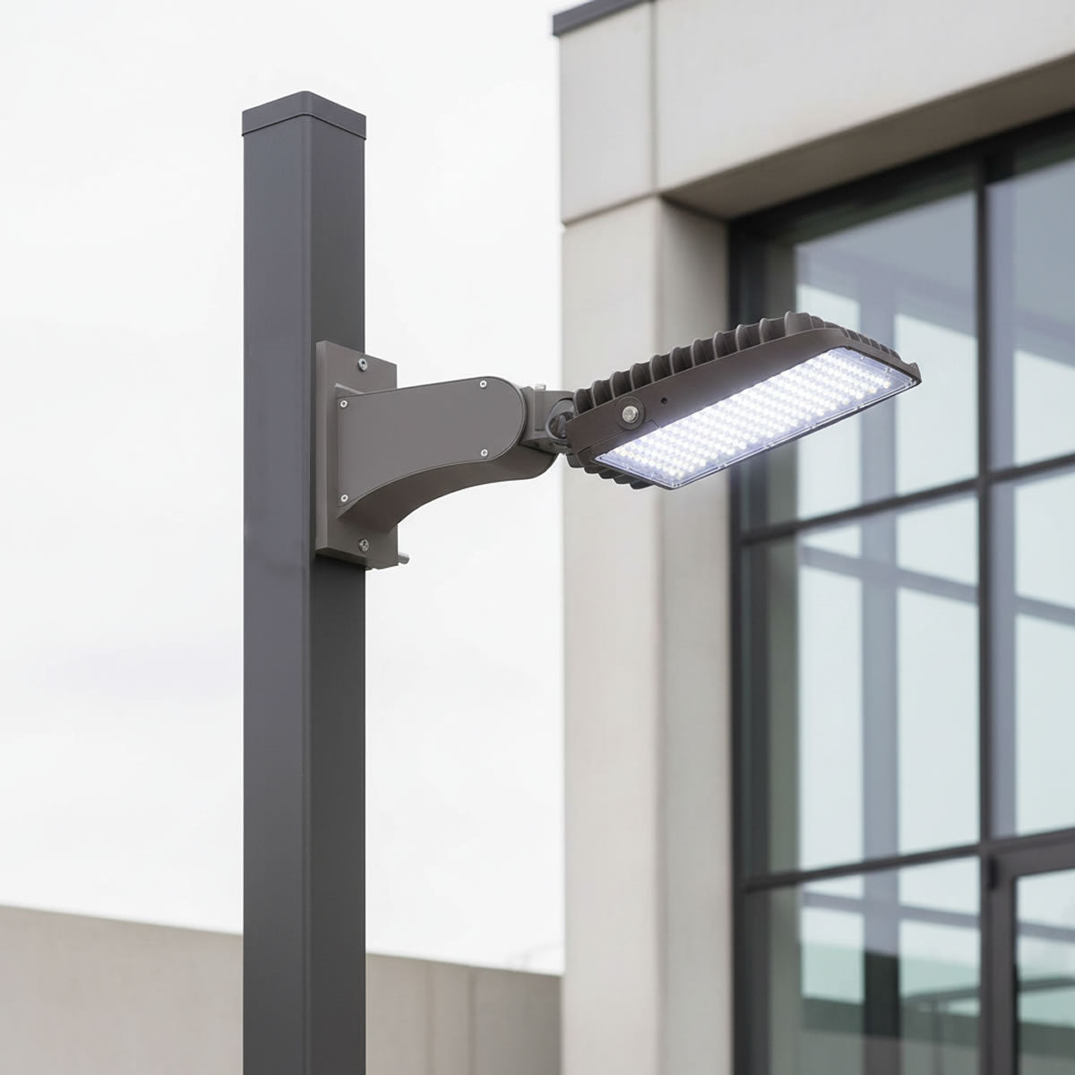 Mounting Arm - For Round or Square Poles - Bronze for Area light of AR08 - Jen Lighting