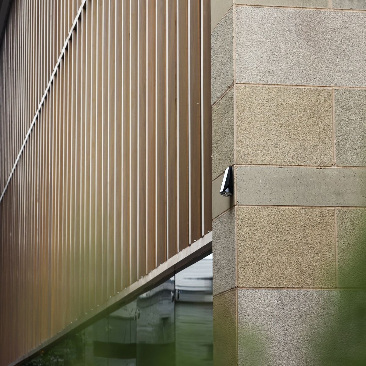 solar wall light installed on the perimeter of the outside of a building