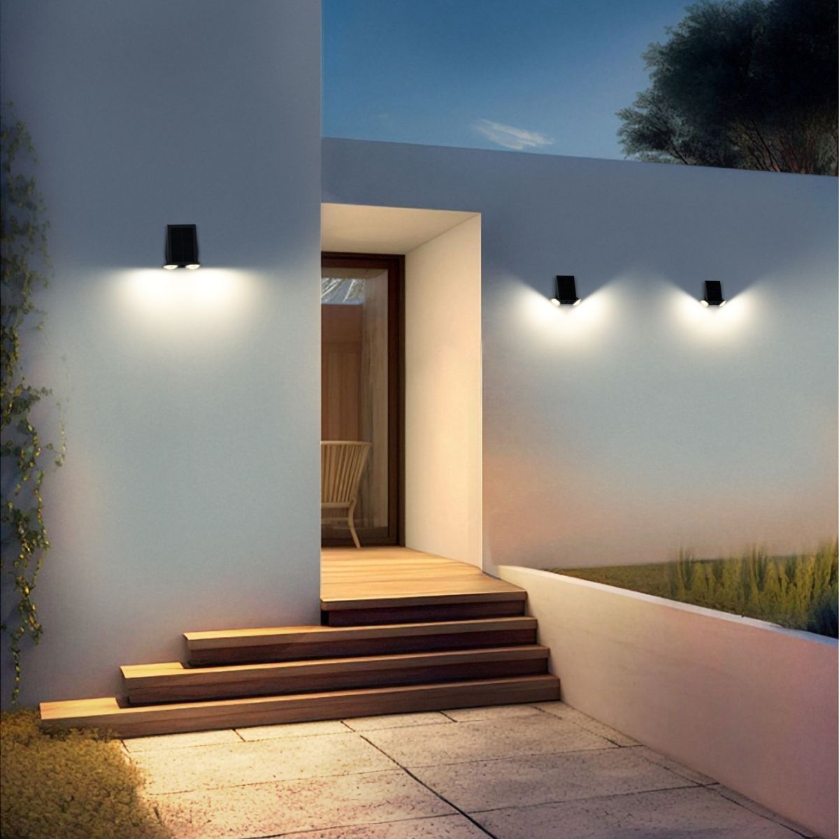 three solar wall lights installed on the outside of a property