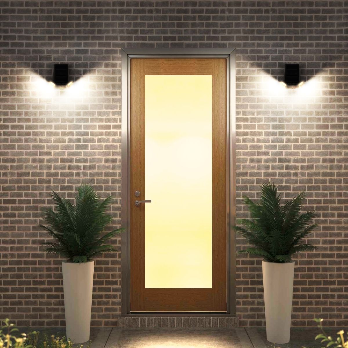 solar wall lights installed on either side of an entrance door